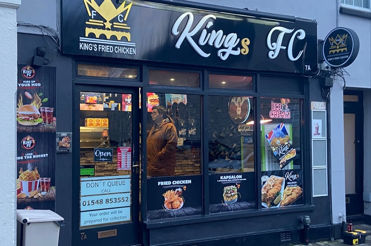 Kings Fried Chicken reopens after racist attack.