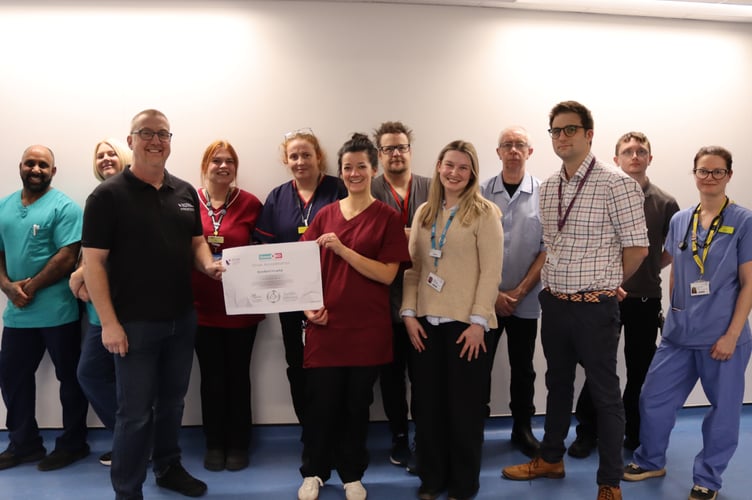 The team receive their award