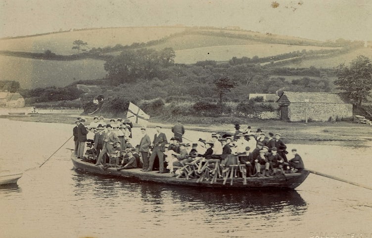 Boat and passengers on river at Aveton Gifford
