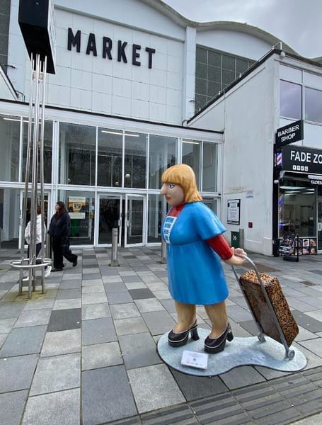 The Cheerful Shopper sculpture outside Plymouth Market. Picture by Alison Stephenson