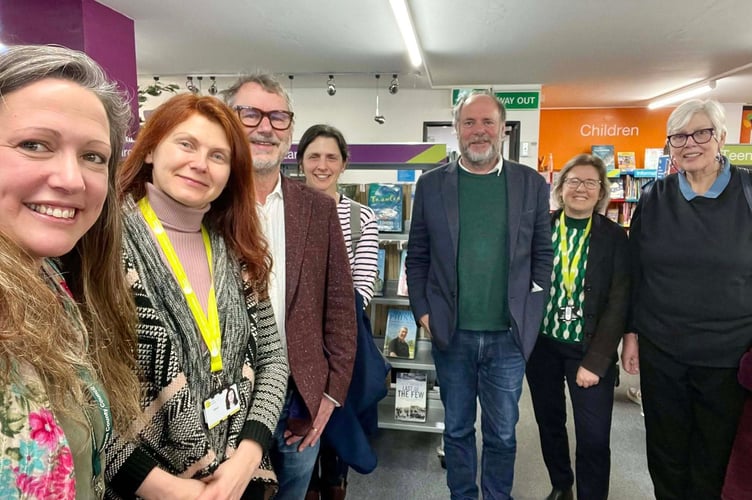 Councillor Cheryl Cottle-Hunkin (far left) at Dartmouth Library as part of her tour around some of the county's libraries during the consultation on their future