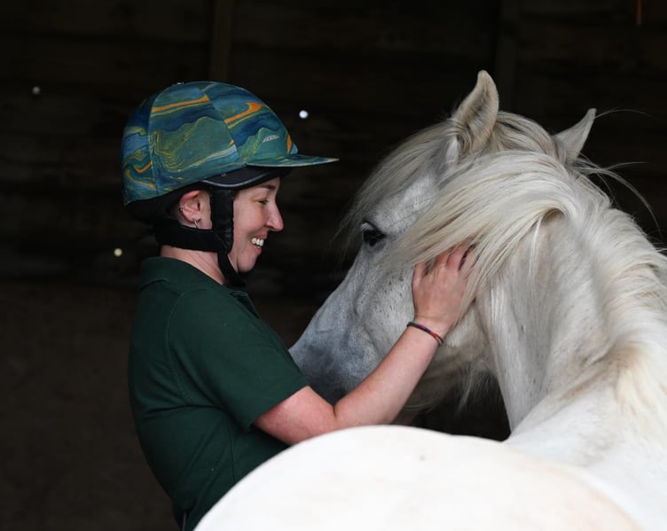 Eva Novi works with the ponies
